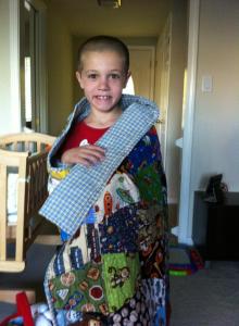 Older brother nephew with his tumbler quilt